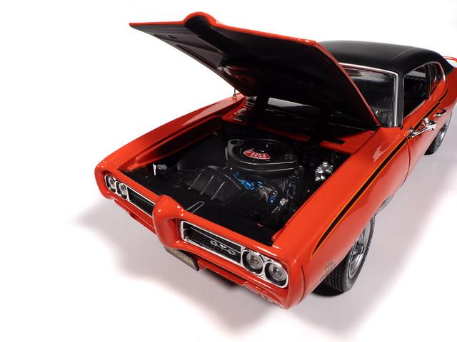 Autoworld 1:18 1969 Pontiac GTO Judge  (Mecum Auctions)